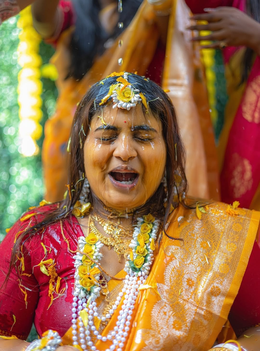 Bride during joyful haldi ceremony